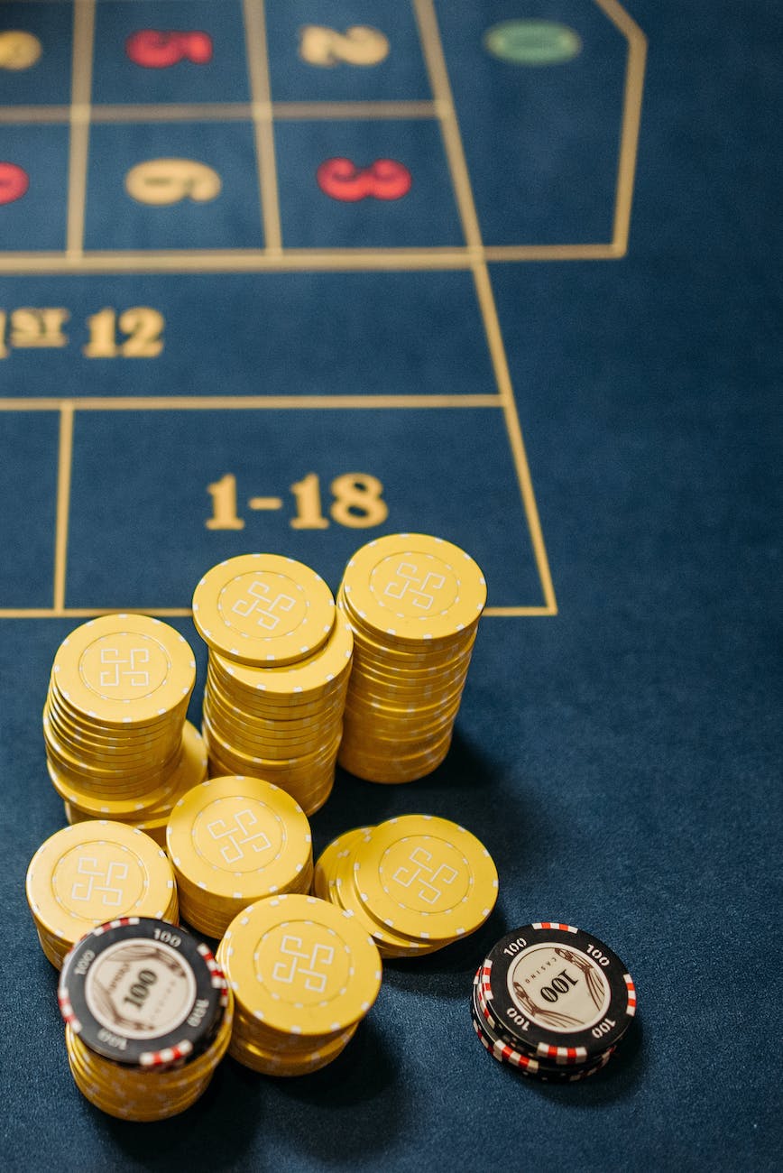 casino gambling chips in the roulette game table